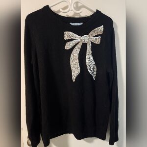 Large sequin bow sweater